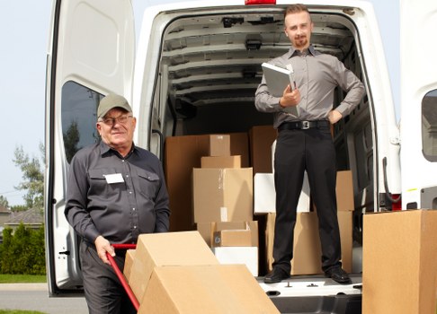 Office removals planning in Kentish Town with moving boxes and desks