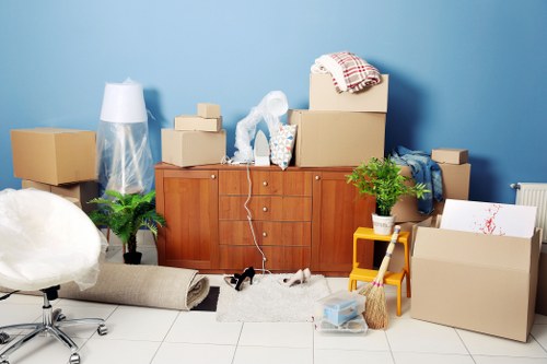 Professional piano removals team working in a Kentish Town residential street