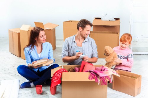 Moving boxes and furniture with a Kentish Town removal van