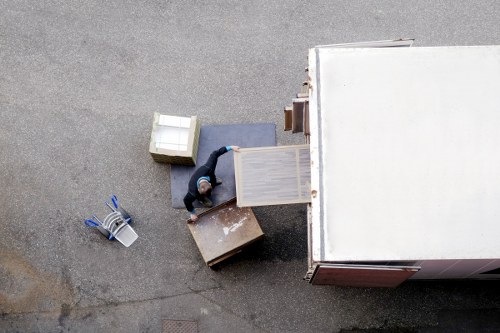 Local removal crew managing access and stairs in Kentish Town