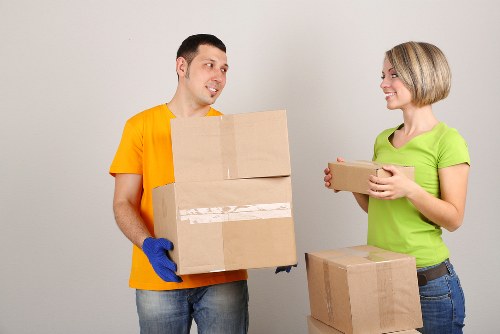Preparation for an office move with labelled boxes and packed IT equipment